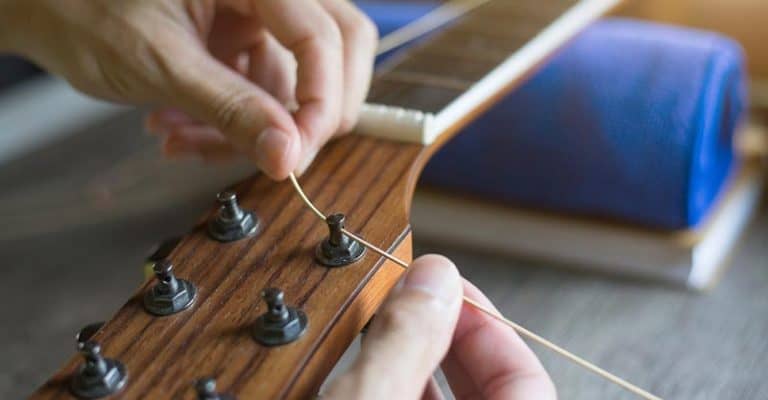 How To Restring An Acoustic Guitar; Easily Change Your Guitar Strings Today